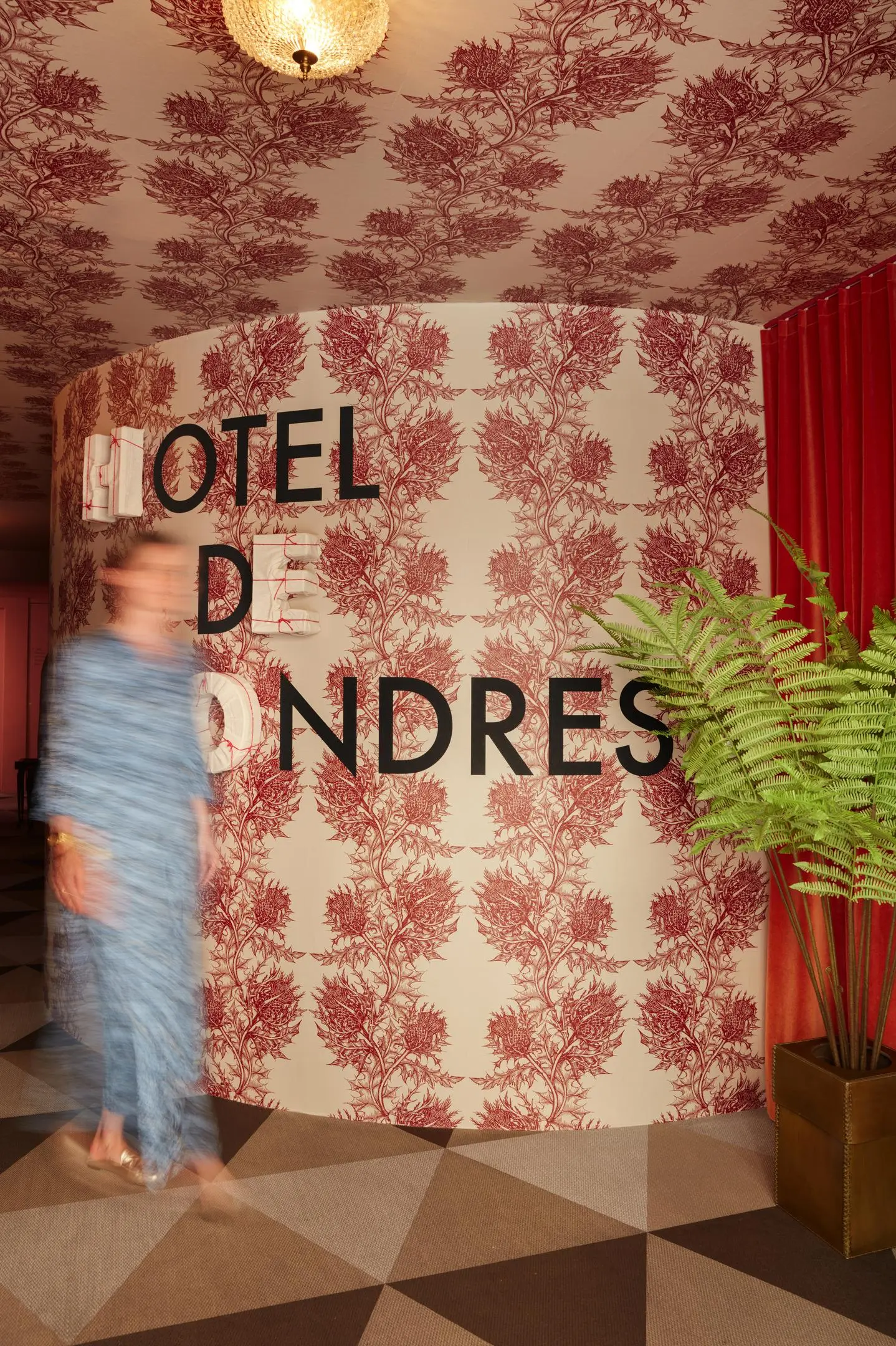Hotel lobby with Timorous Beasties wallpaper and picnic-style seating