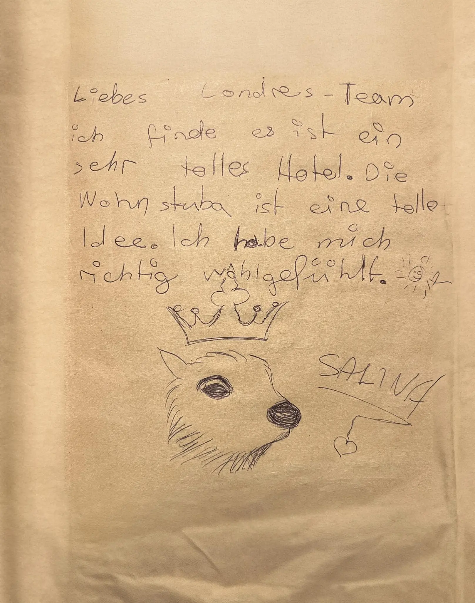 Guestbook entry about Hotel Londres with positive feedback and a drawing of a marmot wearing a crown, the hotel mascot