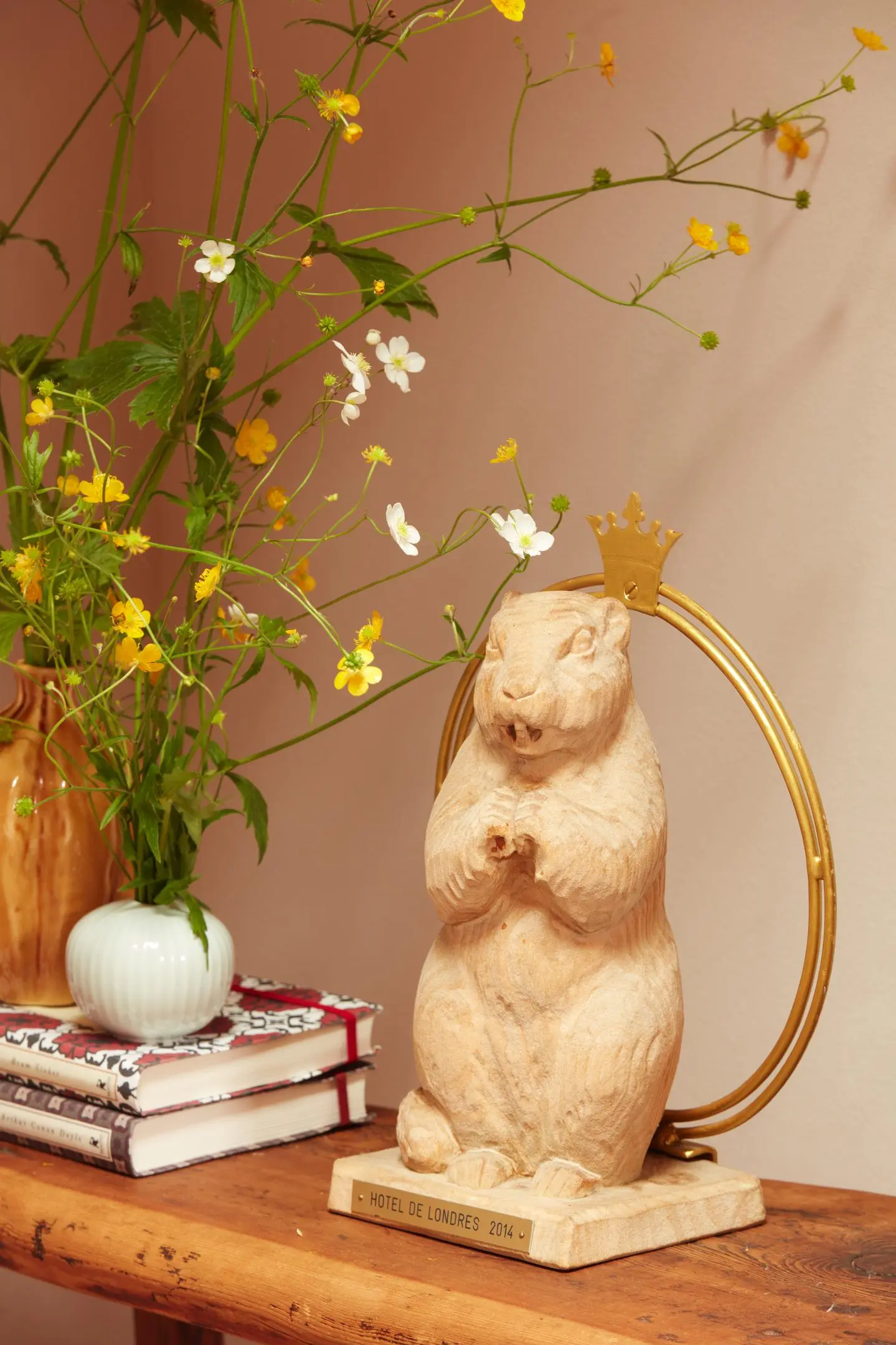 Murmeli wearing a crown, mascot of Hotel de Londres and symbol of its hospitality and motto “At Home with Friends